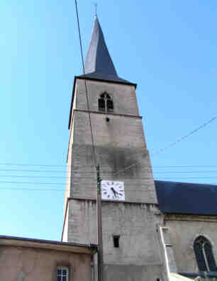 église Vézelise : flèche vrillée culminant à 70m